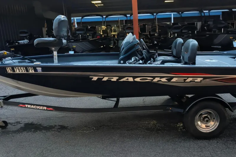 Slide: The Image of 2022 Tracker Pro Team 175 TF boat on trailer in showroom. - 7
