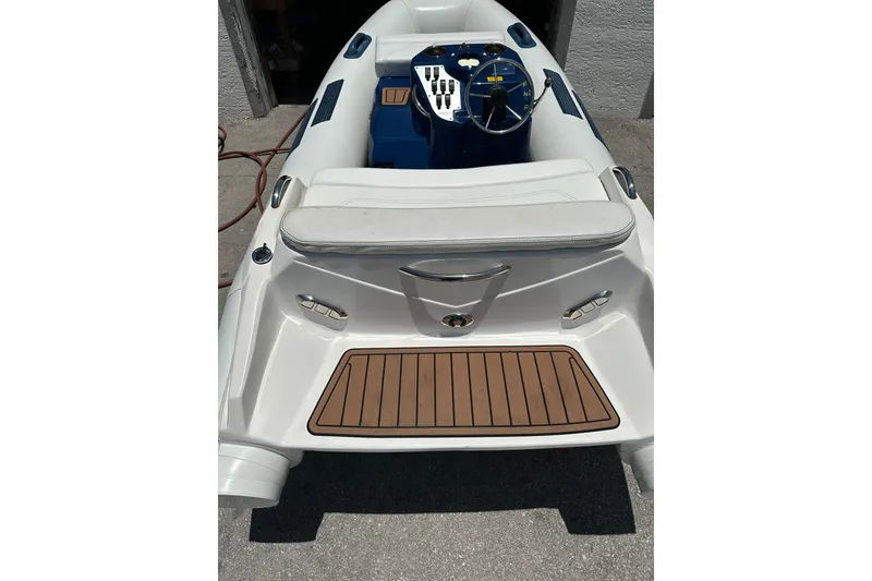 Slide: The Image of Ribjet 10 boat, 2020 model, featuring a sleek design and modern controls. - 6