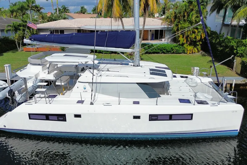 The Image of 2021 Leopard 45 catamaran docked, featuring sleek design and spacious deck. - 0