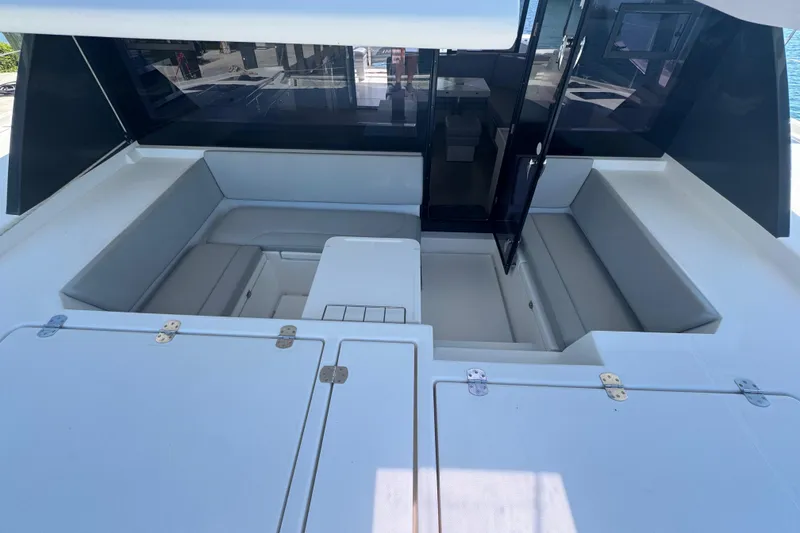 Slide: The Image of Luxurious seating area on a 2021 Leopard 45 yacht, featuring sleek design and ample space. - 101