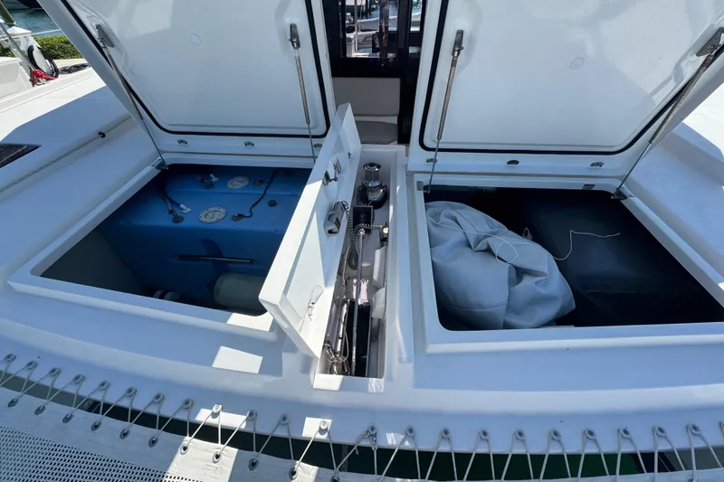 Slide: The Image of Open storage compartments on a 2021 Leopard 45 catamaran deck. - 111