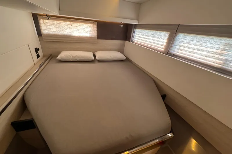 Slide: The Image of Luxurious bedroom interior of 2021 Leopard 45 yacht with modern design and cozy bedding. - 120