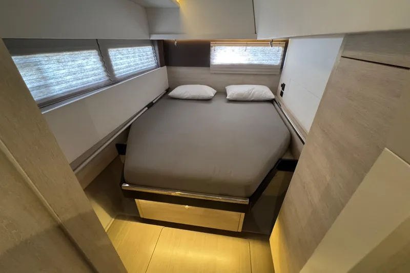 Slide: The Image of Modern bedroom interior in 2021 Leopard 45 yacht, featuring a cozy double bed. - 142
