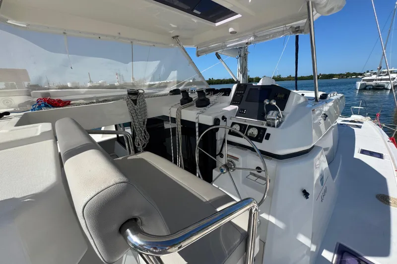 Slide: The Image of Helm of 2021 Leopard 45 catamaran with modern navigation equipment and seating. - 54