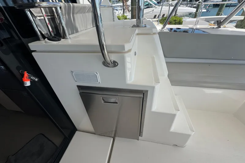 Slide: The Image of Staircase and storage area on a 2021 Leopard 45 catamaran yacht. - 79