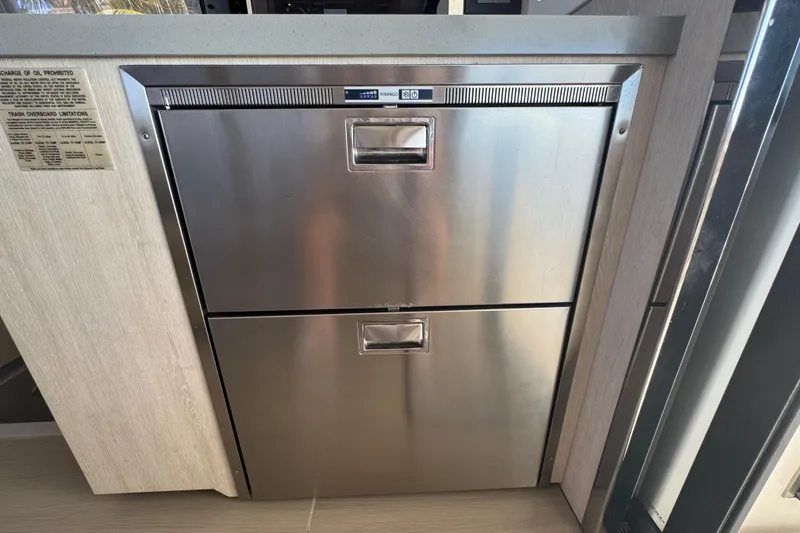 Slide: The Image of Stainless steel drawers in a 2021 Leopard 45 yacht interior. - 90