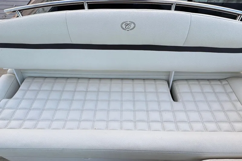 Slide: The Image of 2019 Cobalt R3 boat seat with white quilted upholstery and logo detail. - 10