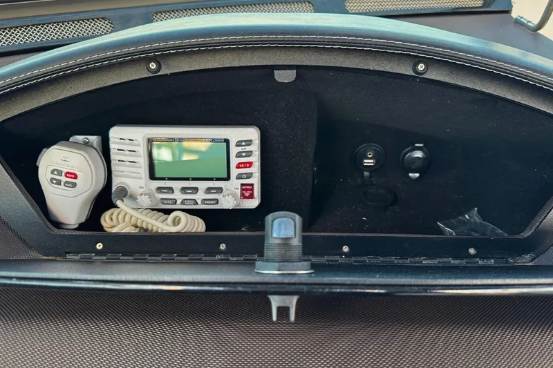 Slide: The Image of 2019 Cobalt R3 boat dashboard with radio and USB ports. - 23
