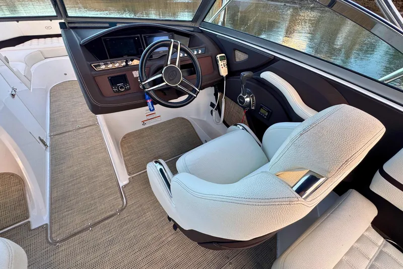 Slide: The Image of 2019 Cobalt R3 boat interior with steering wheel and control panel. - 24