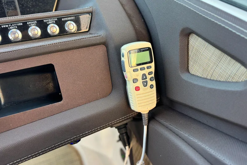 Slide: The Image of Control panel and radio in 2019 Cobalt R3 boat interior. - 30
