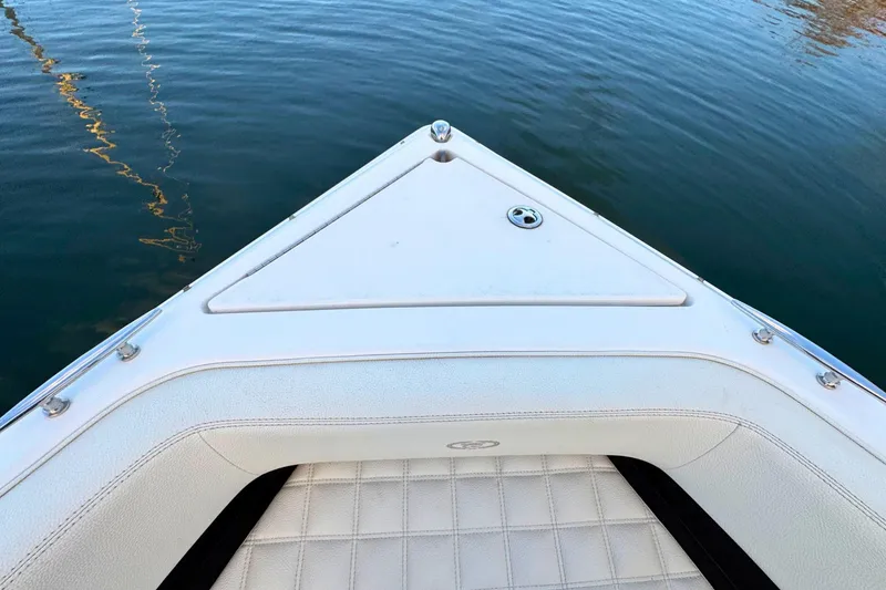 Slide: The Image of Bow of a 2019 Cobalt R3 boat on calm water. - 36