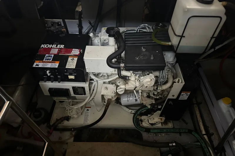 Slide: The Image of Engine room of a 1998 Silverton 372 Motor Yacht with Kohler generator. - 23