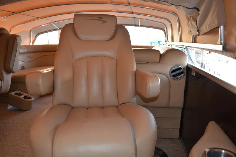 Slide: The Image of Luxurious interior of 2018 Bennington 21 SSRX pontoon boat with tan leather seating. - 11