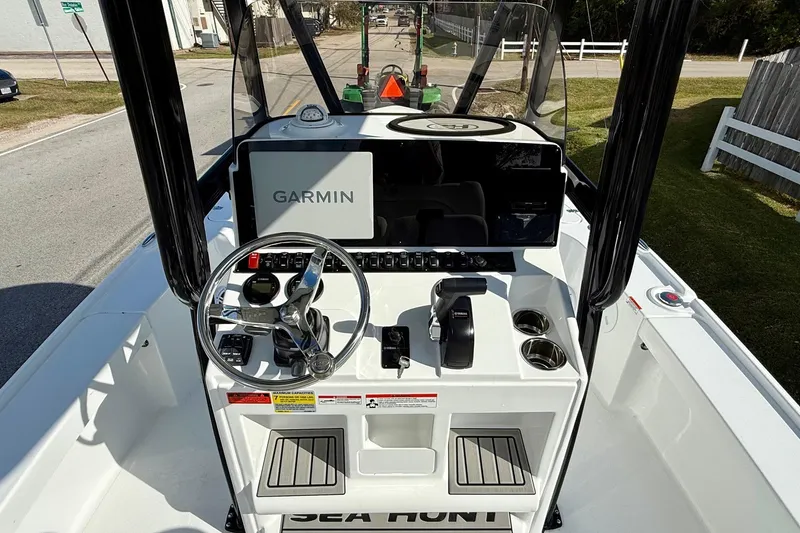 Slide: The Image of 2026 Sea Hunt BX 22 BR boat console with Garmin navigation system and steering wheel. - 11