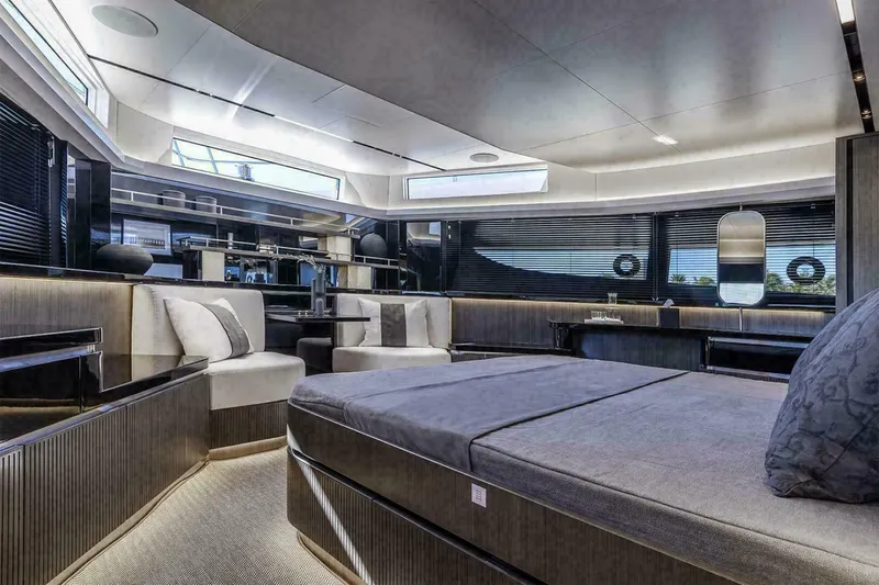 Slide: The Image of Luxurious interior of 2025 Pearl 72 yacht with modern seating and ocean view. - 11