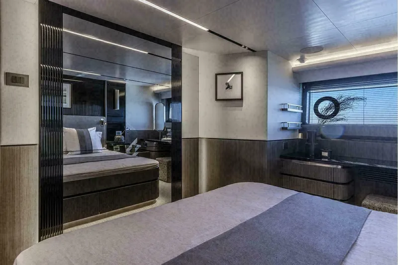 Slide: The Image of Luxurious interior of 2025 Pearl 72 yacht with elegant seating and scenic windows. - 16