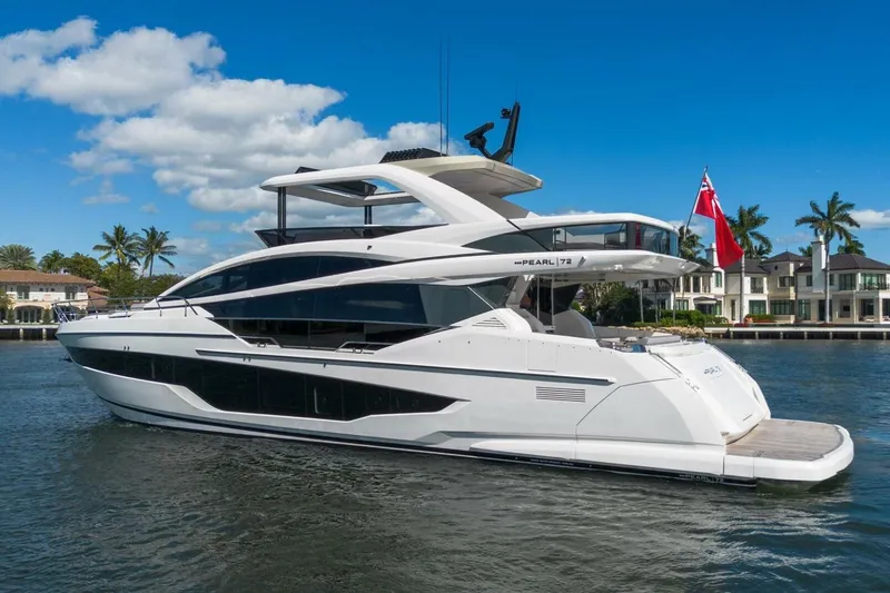 Slide: The Image of Luxurious 2025 Pearl 72 yacht cruising on a sunny day, featuring sleek modern design. - 55
