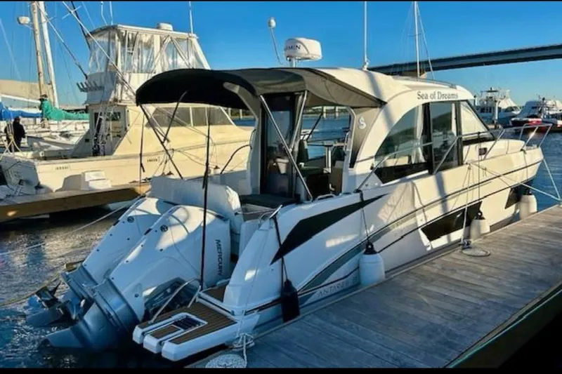 Slide: The Image of 2024 Beneteau Antares 9 docked, featuring sleek design and modern amenities. - 0