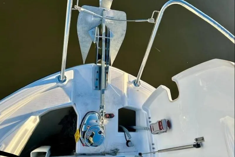 Slide: The Image of Bow view of 2024 Beneteau Antares 9 with anchor and railing details. - 19