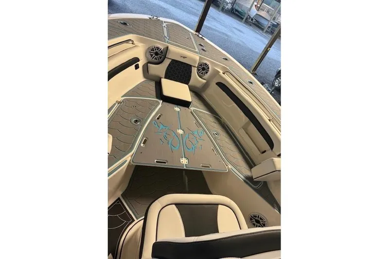 Slide: The Image of 2024 Tidewater 232 LXF boat interior with stylish seating and modern design. - 8