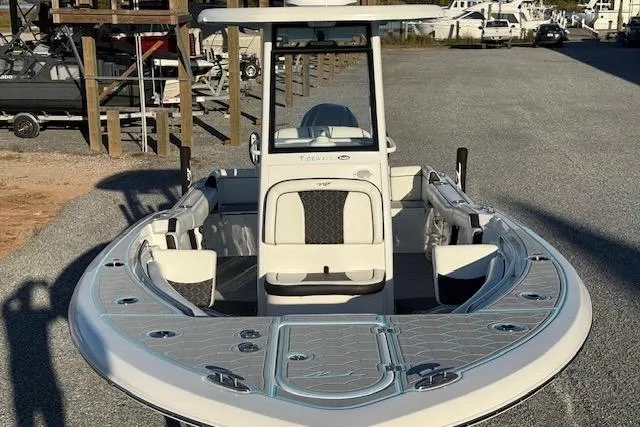 Slide: The Image of 2024 Tidewater 232 LXF boat with sleek design and spacious seating. - 6