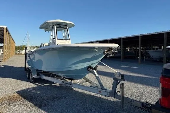 Slide: The Image of 2024 Tidewater 232 LXF boat on trailer in storage area. - 7