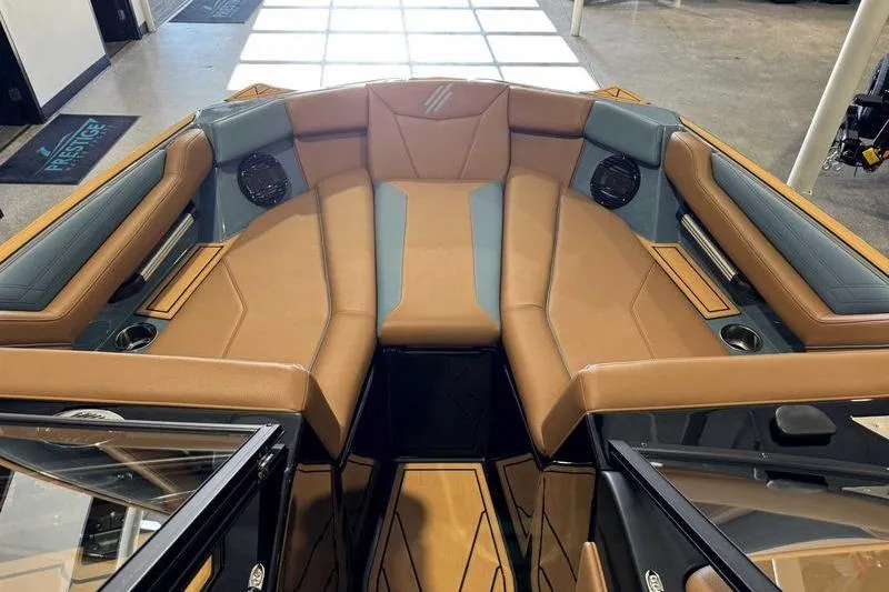 Slide: The Image of 2026 ATX Surf Boats 22 Type-S interior with tan and gray seating, modern design. - 10