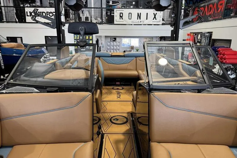 Slide: The Image of Interior of 2026 ATX Surf Boats 22 Type-S with tan and blue seating. - 11