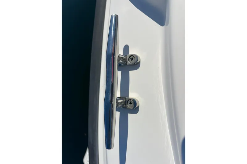 Slide: The Image of Stainless steel cleat on 2015 Boston Whaler 270 Dauntless boat. - 18