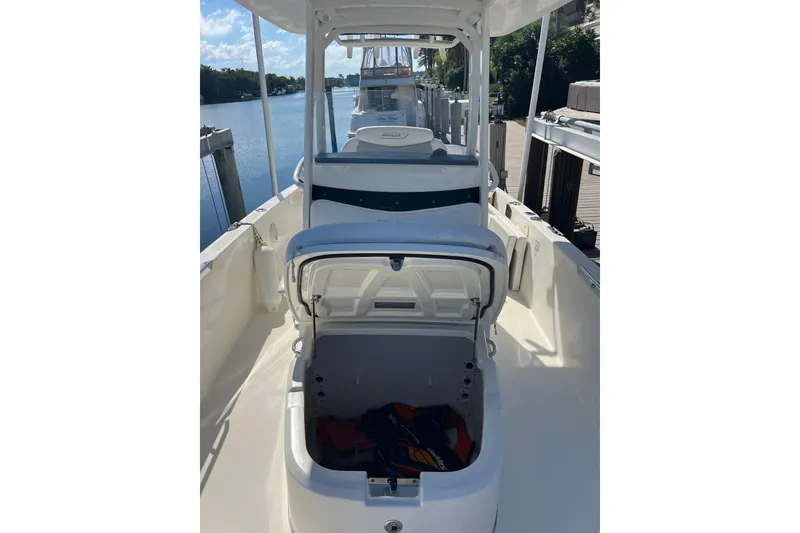 Slide: The Image of 2015 Boston Whaler 270 Dauntless boat interior with open storage compartment. - 25