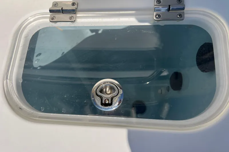 Slide: The Image of Hinged hatch with latch on 2015 Boston Whaler 270 Dauntless boat. - 28