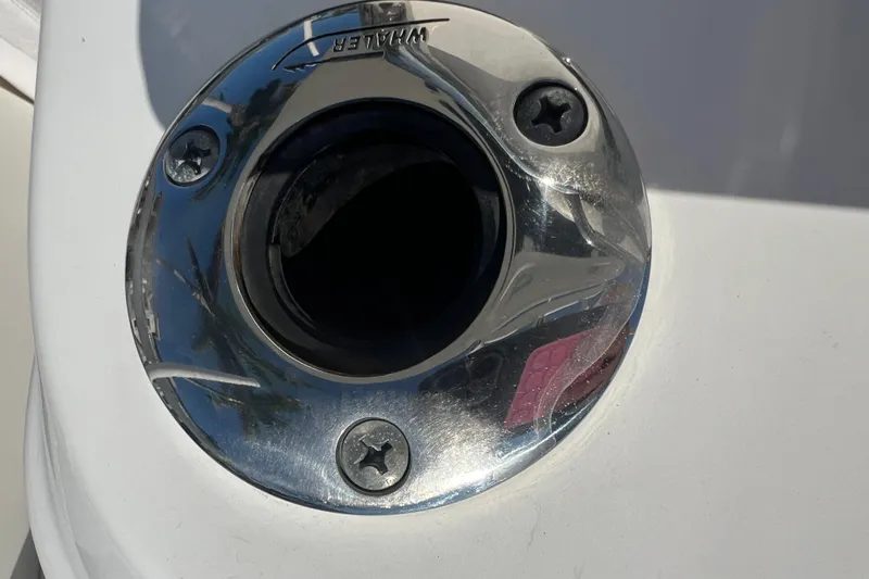 Slide: The Image of Close-up of a 2015 Boston Whaler 270 Dauntless boat's metal fitting. - 30
