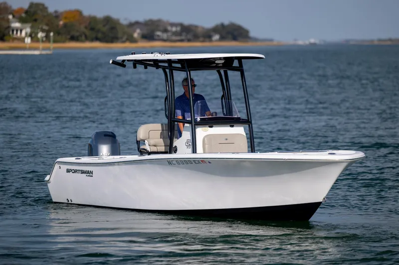 Slide: The Image of 2022 Sportsman Open 212 Center Console boat on calm water. - 3