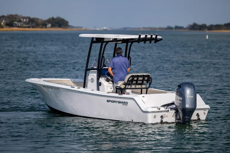 Slide: The Image of 2022 Sportsman Open 212 Center Console boat on calm water. - 7