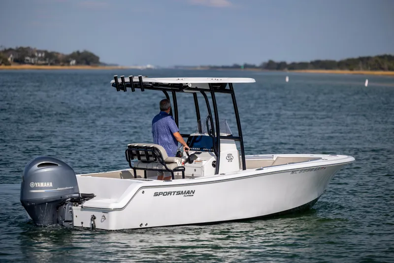 Slide: The Image of 2022 Sportsman Open 212 Center Console boat on water with Yamaha engine. - 9