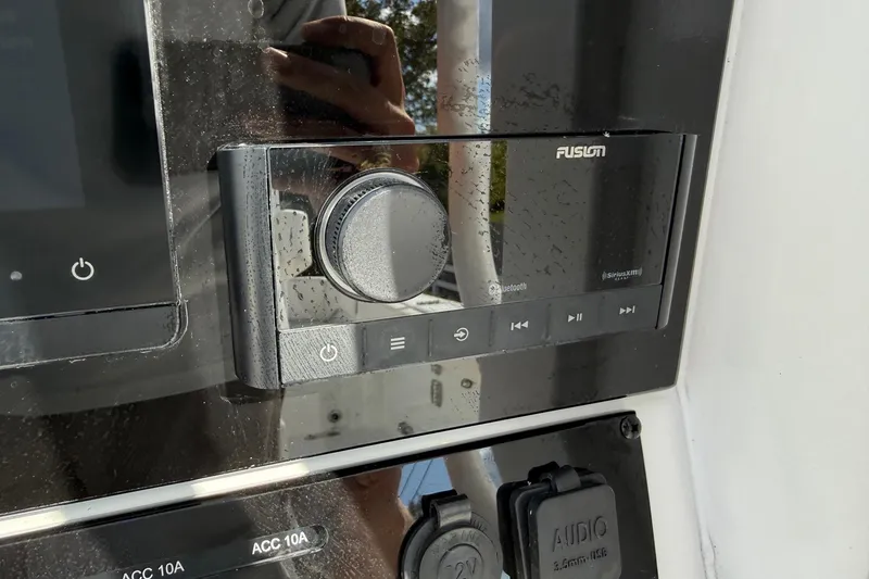 Slide: The Image of Fusion audio system on 2026 Sea Hunt Ultra 285 Coffin Box boat dashboard. - 20