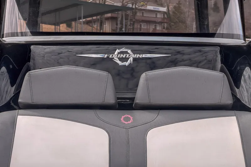 Slide: The Image of 2020 Fountain 43 NX boat interior with logo and cushioned seating. - 28