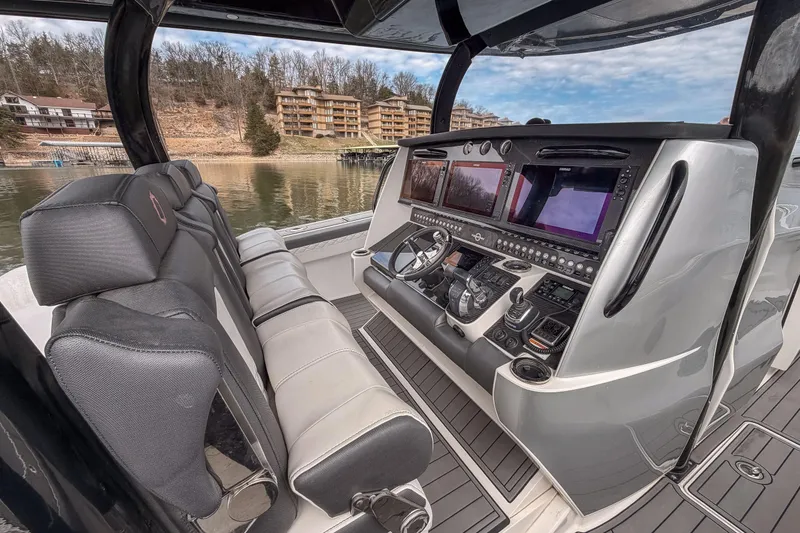 Slide: The Image of Interior of 2020 Fountain 43 NX boat with advanced navigation controls and seating. - 35