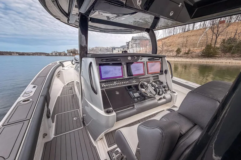 Slide: The Image of 2020 Fountain 43 NX boat interior with advanced navigation system and luxurious seating. - 39