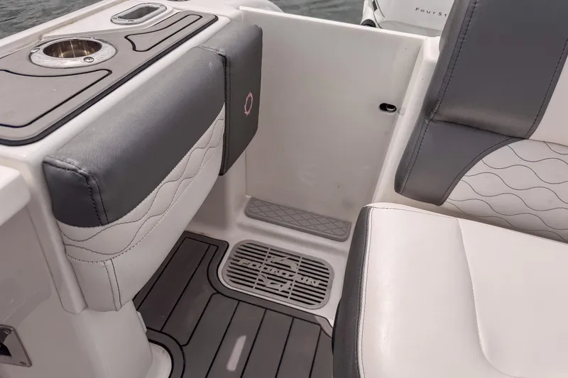 Slide: The Image of Interior seating of 2020 Fountain 43 NX boat with stylish upholstery and cup holder. - 51