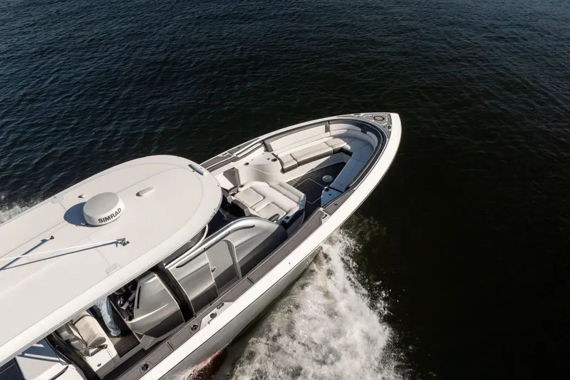 Slide: The Image of 2020 Fountain 43 NX boat cruising on open water, aerial view. - 8
