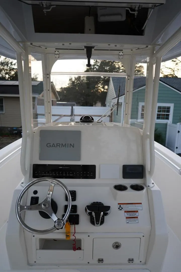 Slide: The Image of 2022 Cobia 266 boat dashboard with Garmin navigation system. - 5