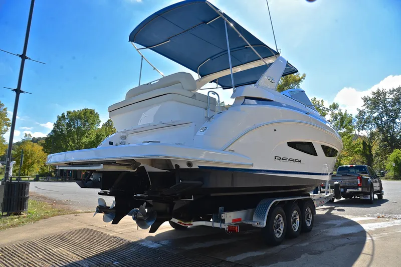 Slide: The Image of 2018 Regal 33 Express boat on trailer, ready for transport. - 17