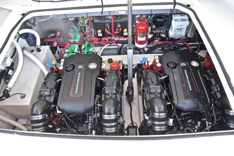 Slide: The Image of Engine compartment of 2018 Regal 33 Express with dual Volvo Penta engines. - 42