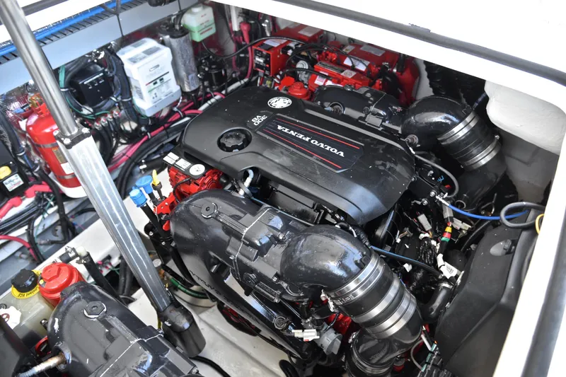 Slide: The Image of Engine compartment of a 2018 Regal 33 Express boat with Volvo Penta engine. - 44