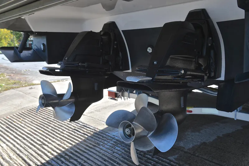 Slide: The Image of 2018 Regal 33 Express boat propellers and stern drive detail. - 46