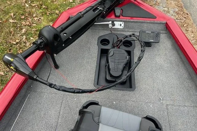 Slide: The Image of 2024 Tracker Pro Team 175 TXW boat deck with trolling motor and fish finder. - 17