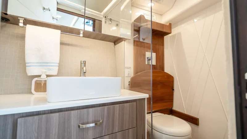 Slide: The Image of Modern bathroom interior in 2022 Regal 36 Grande Coupe yacht. - 18