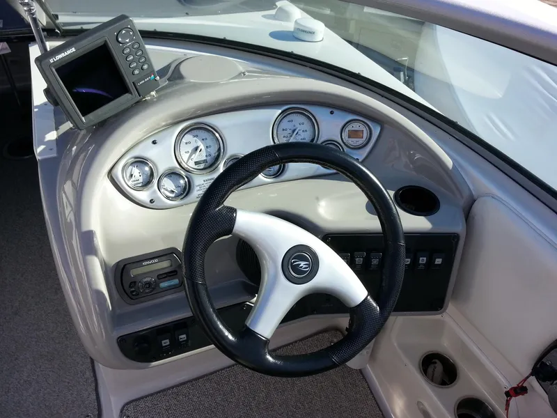 Slide: The Image of 2006 Monterey 233 Explorer dashboard with steering wheel and gauges. - 22