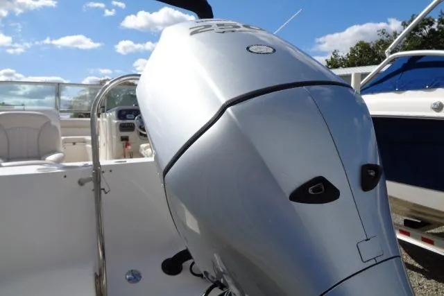 Slide: The Image of 2005 Robalo R227 Dual Console boat with powerful outboard motor, sunny day. - 7